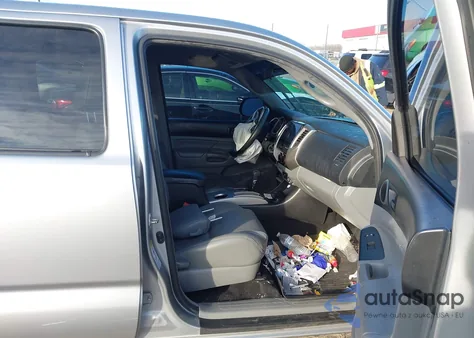 2014 Toyota Tacoma Base V6 z USA, uszkodzony, nr VIN 5TFLU4EN3EX093091